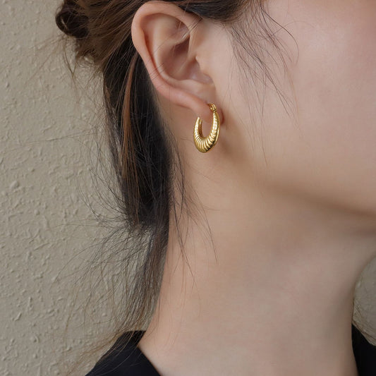 Boucles d’oreilles créoles dorées croissant